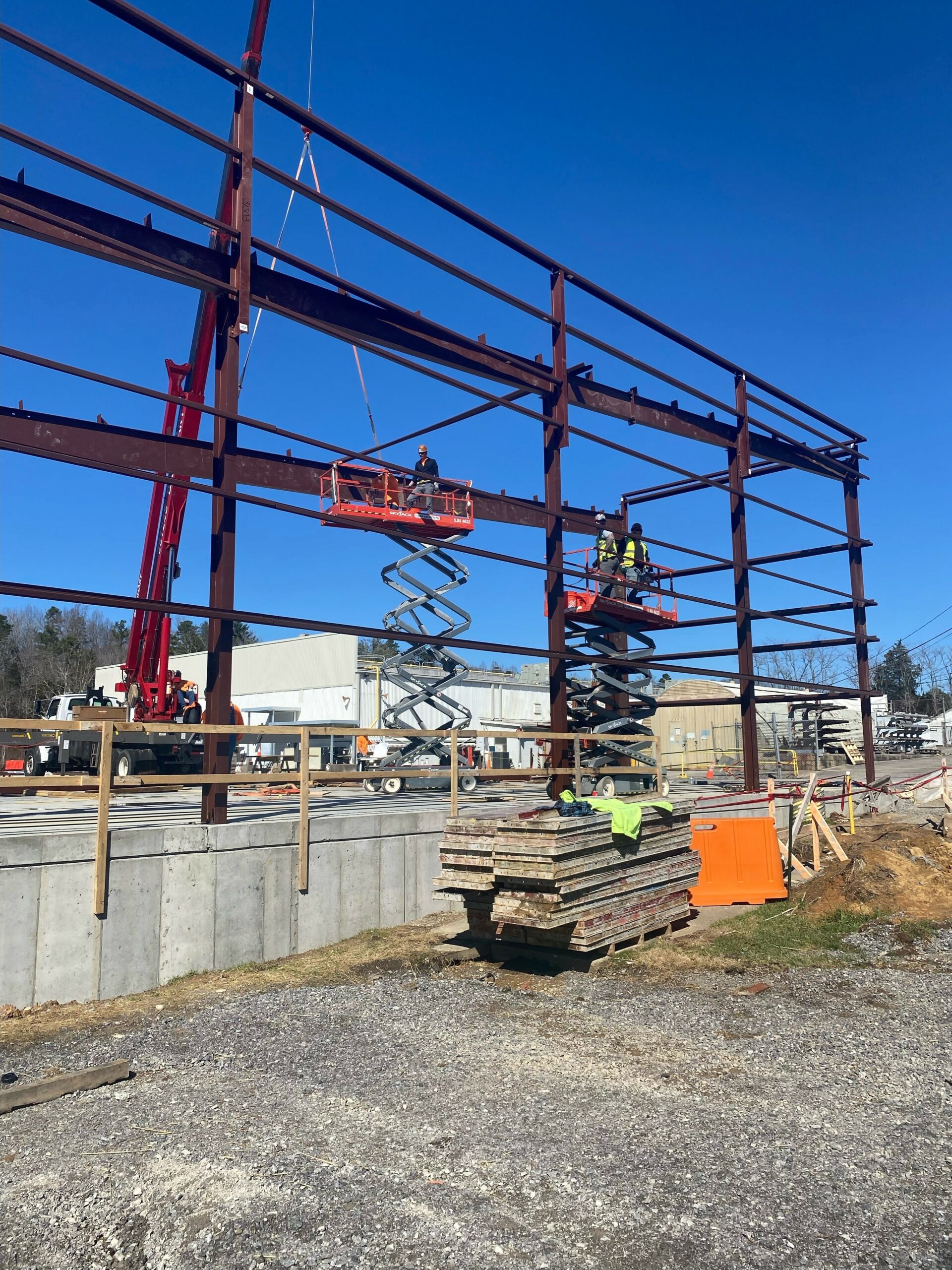 The field services division setting the structural steel for Building 7012.